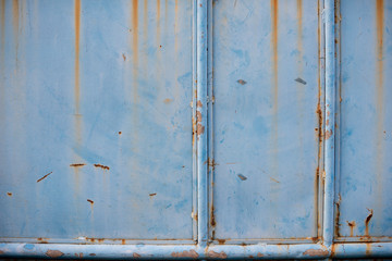 A close up of blue rustic gate with full details.