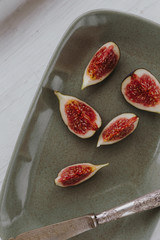 Fresh organic fig on a ceramic plate