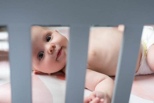 Fototapeta Baby in crib