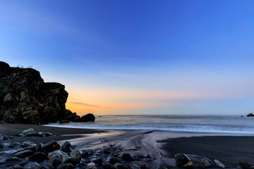 Fototapeta na wymiar Calm Sunset Over Limekiln Beach, Big Sur, CA
