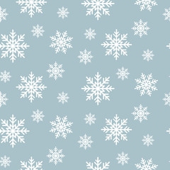 Fototapeta na wymiar Snowflake seamless vector pattern. Snow flakes on blue winter background. Abstract wallpaper and gift paper wrap design.
