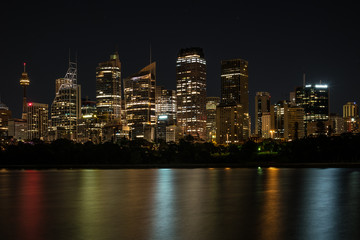 Fototapeta na wymiar Sydney City at night seen from Farm Cove