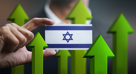 Nation Growth Concept, Green Up Arrows - Businessman Holding Card of Israel Flag