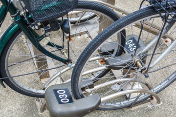 Fototapeta na wymiar Close up Parking for Bicycles with key lock wheel in Kyoto,Japan