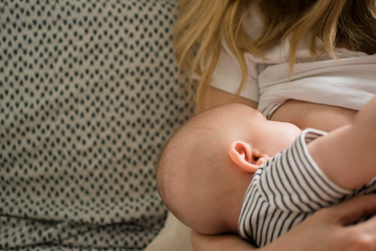 Mother breastfeeding baby