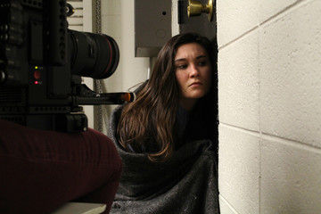 Obraz na płótnie Canvas Actress on camera behind the scenes on a film or TV set