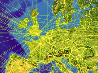 Western Europe from space on Earth with country borders and lines representing international communication, travel, connections.