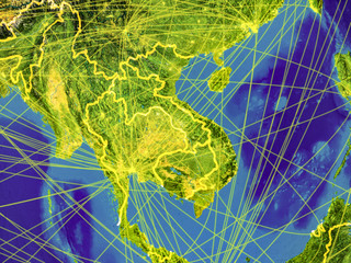 Indochina from space on Earth with country borders and lines representing international communication, travel, connections.