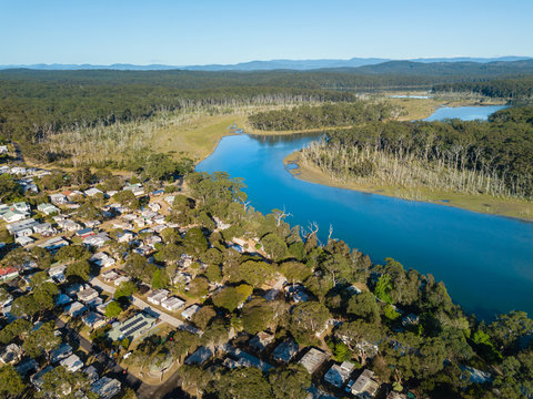 aerial view of holiday park by river