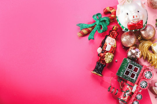 Christmas toys in a handful with a place under the signature, top view, greeting card