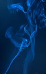 Abstract blue smoke swirls