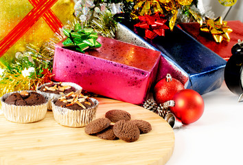 Chocolate brownie and cookei on wood plate with  Christmas decoration backgrounds