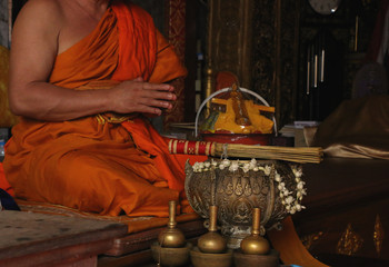 Monk give blessed water for people at Doi Suthep, Chiang Mai, Thailand
