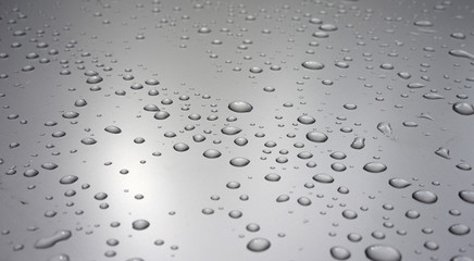Raindrops on metal surface