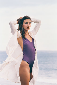 Windy Beach Portrait of Beautiful Caucasian Woman Posing in Viol