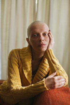 Portrait of woman with shaved head