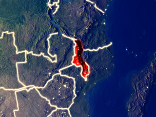 Obraz na płótnie Canvas Malawi from space on Earth at night. Very fine detail of the plastic planet surface with bright city lights.