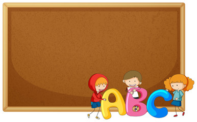 Kids holding ABC on corkboard