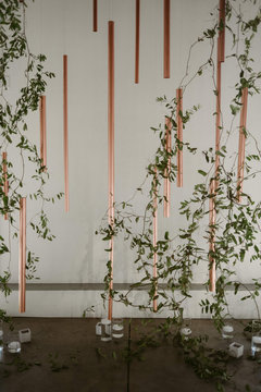 Industrial handmade diy copper and vine botanical hanging backdrop