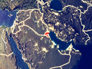 Kuwait from space on Earth at night. Very fine detail of the plastic planet surface with bright city lights.