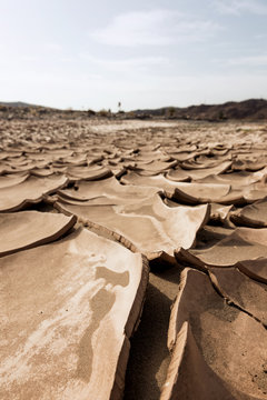 Dry river in front of an old adobe village. Morocco, Africa