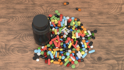 Blank black plastic bottle and pile of pills