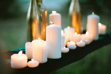 Tilt-shift photo of assorted burning candles