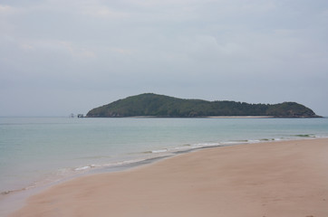 Fototapeta na wymiar The Middle Keppel Island as seen from the Great Keppel Island beach in the Tropic of Capricorn area in the Central Queensland