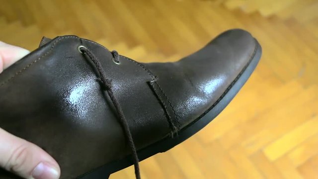 Spraying of suede shoes with waterproof spray. Waterproof Suede Shoes