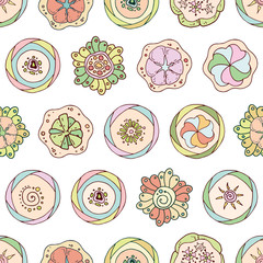 Abstract seamless pattern in doodle style with flowers.