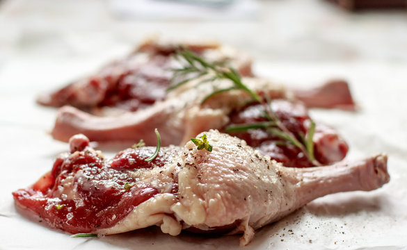 Raw spiced duck leg 