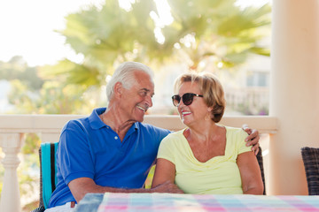 Portrait of smiling elderly couple
