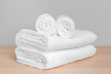 Obraz na płótnie Canvas Clean soft towels on color background