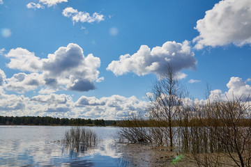 Fototapeta premium Sky and clouds reflection on water of Lake
