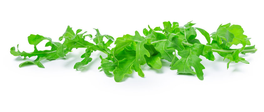 rucola or arugula, heap, salad leaves, isolated on white background