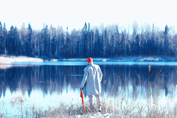 Fototapeta na wymiar adventure winter trekking / man against the backdrop of a beautiful winter landscape, hike in winter Europe. Nature freedom concept