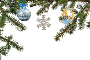 Branches of fir tree with Christmas ornament on white isolated background.