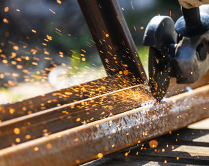 Sparks from cutting metal on the rack