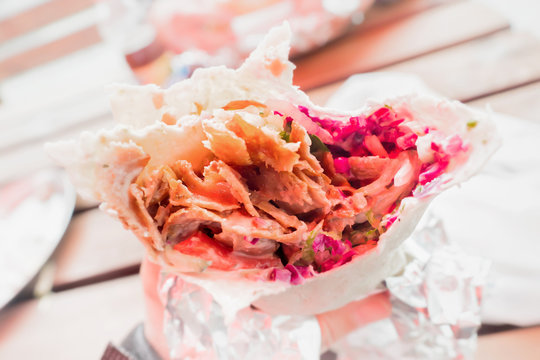 Close-up of a kebab being eaten