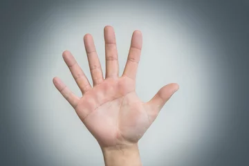 Fotobehang hand with six fingers, human mutation, not like everyone else, strange man, evolution. concept © Асель Иржанова