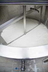 Process Of Making Dairy Products-Preparing Milk For Cheese,Sour Cream And Yogurt Production , Milk Pasteurization  In Large Milk Storage Tanks In Modern Dairy Factory Top View