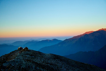 Fototapeta na wymiar Sunrise above mountain in valley Himalayas mountains Mardi Himal