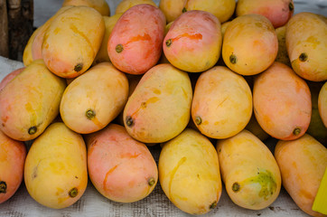 A group of mango in the market.