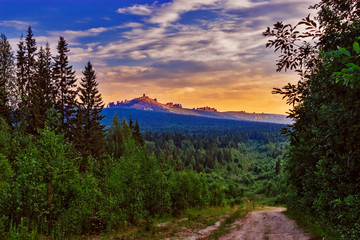 forest and the footpath to the mountain in the urals
