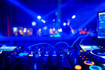 Obraz na płótnie Canvas DJ playing music on light background