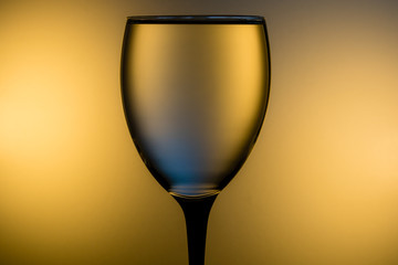 a glass of gold color