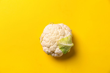 Fresh cauliflower on color background, top view - obrazy, fototapety, plakaty