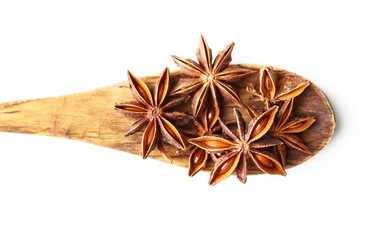 Anise star on spoon wooden isolated on white background