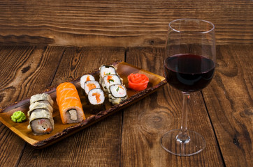 Fototapeta na wymiar sushi on wooden table