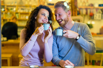 Romantic couple having date in coffee shop